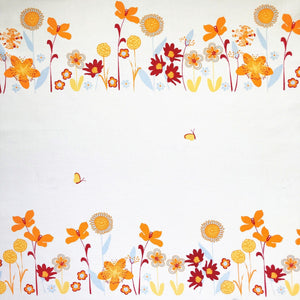 Custom made organic cotton fitted sheet featuring 10 Flowers design by Harmony Arts for a cozy baby nursery.