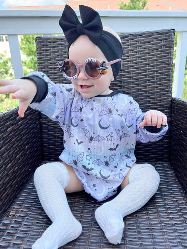 Purple Halloween baby sweater romper for festive fall outfits. Perfect for little ones celebrating the season!