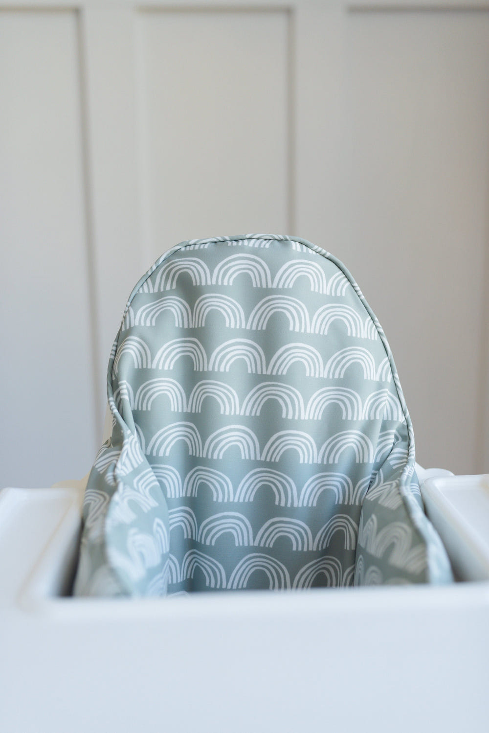 Sage green rainbow cushion cover for IKEA Antilop high chair, perfect for baby seating comfort and style.