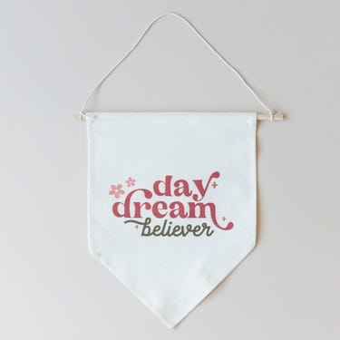 "Daydream Believer Canvas Pennant for nursery wall art, perfect for creating a whimsical baby room decor."
