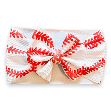 Cute baseball headwrap bow for babies, perfect accessory for hats, socks, and mittens collection.