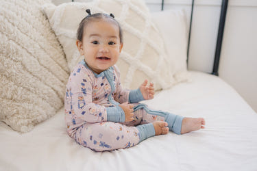Nutcracker print bamboo zippy romper for newborns, perfect for cozy comfort and style.