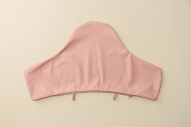 Pink vegan leather IKEA Antilop cushion cover for baby seats, stylish and comfortable seat cushion accessory.