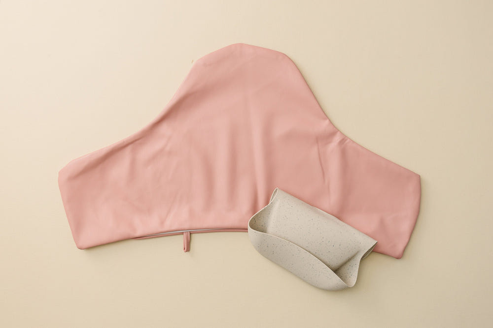 Pink vegan leather IKEA Antilop cushion cover for baby seats, stylish and comfortable seat cushion accessory.