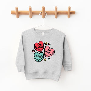 Candy Heart's Sweatshirt for babies, cozy and stylish, shown from angle 3. Perfect for cute, casual outfits.