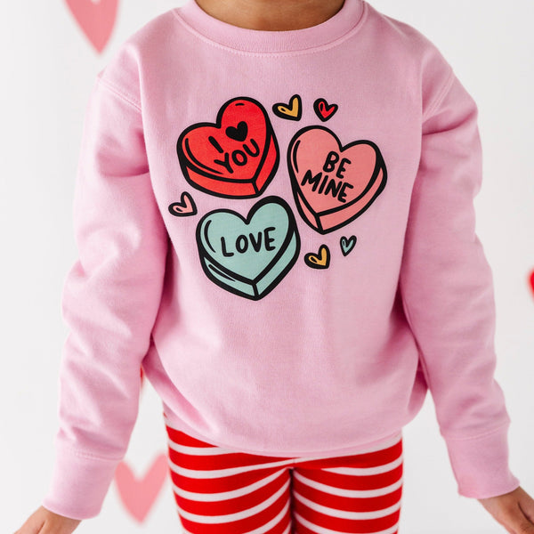 Candy Heart's Sweatshirt for babies, cozy and cute top in vibrant colors, perfect for stylish little ones.