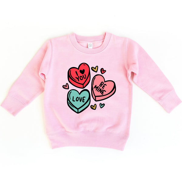 Candy Heart's Sweatshirt for babies, cozy and stylish, showcased from angle 6. Perfect for little ones!