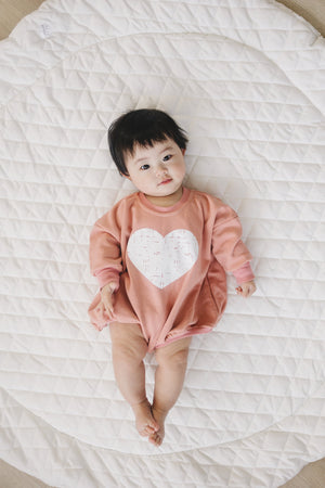 Distressed Heart Sweatshirt Romper in various colors, angle view showcasing style and comfort for babies.