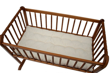 Organic cotton futon pad in rectangle shape, customizable size, perfect for babies' comfort and safety.