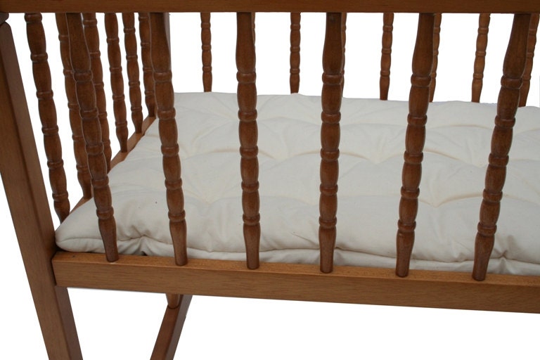 Organic cotton futon pad in rectangle shape, customizable size, perfect for babies' comfort and safety.