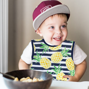 Summer Stripes Pineapple Bapron on sale, shown from angle 2, perfect for stylish and mess-free feeding.