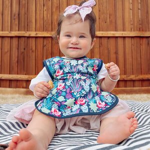 Desert Floral Bapron for babies, stylish and functional, shown at angle 7. Perfect for mealtime messes.