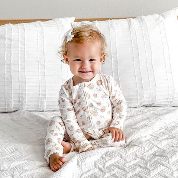 Shwally Romper for babies in a stylish design, angle view showcasing soft fabric and playful colors.