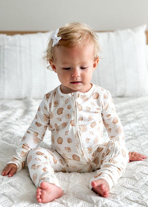 Shwally Romper for babies, stylish design, 60-degree angle view showcasing soft fabric and vibrant colors.