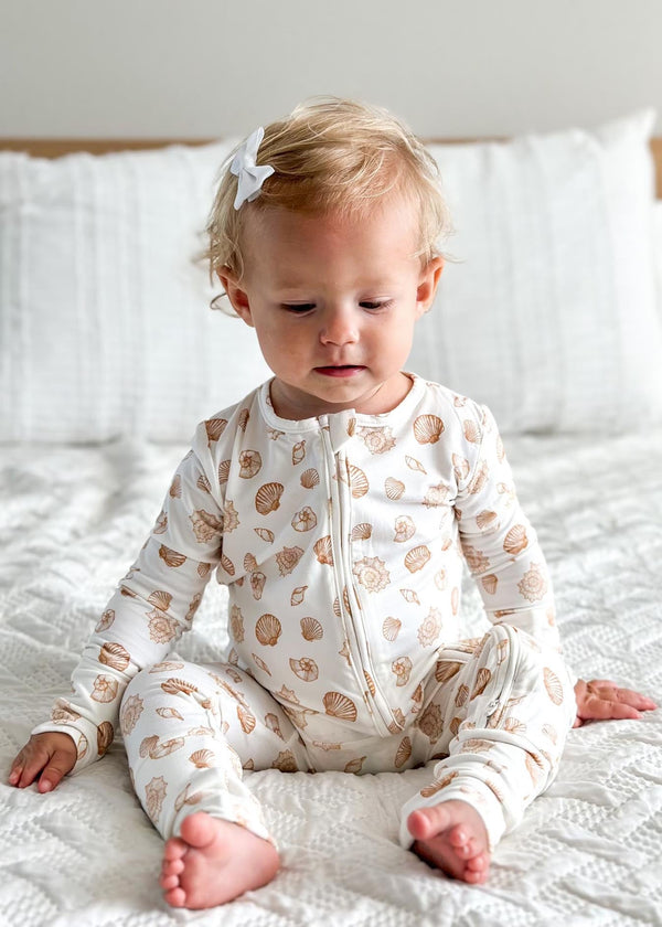 Shwally Romper for babies, stylish design, 60-degree angle view showcasing soft fabric and vibrant colors.