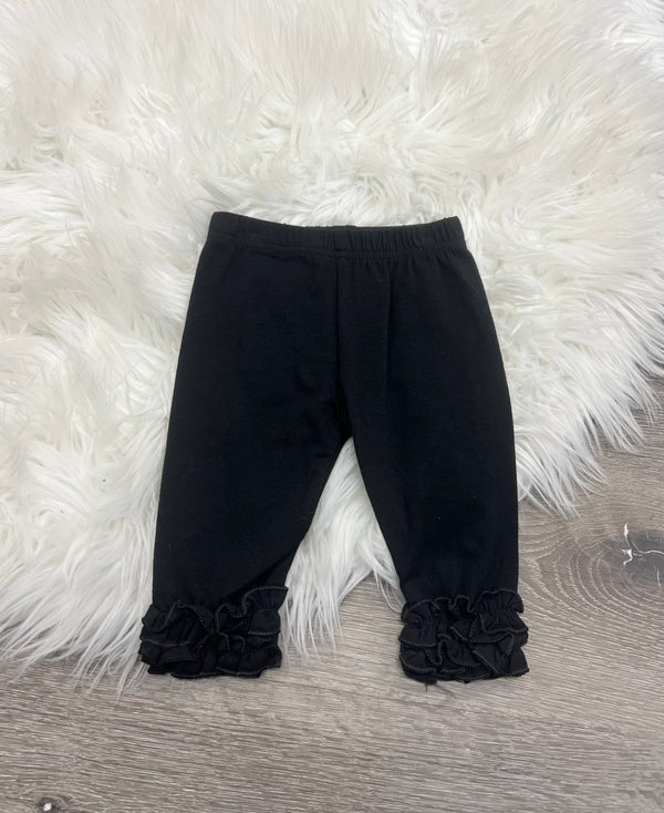 Black Icing Capris for babies, stylish and comfortable pants for everyday wear.