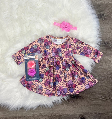 Blushing Purple Petals Dress for babies, featuring a charming floral design and soft fabric, perfect for special occasions.