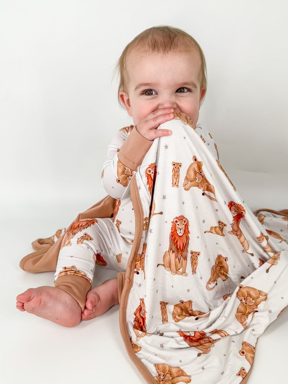 Soft Just Lion Around Blanket for babies, perfect for swaddling and cozy comfort.