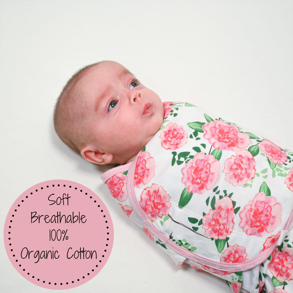 Organic baby sleep swaddle in floral design, perfect for cozy and safe sleep. Live Life In Full Bloom collection.