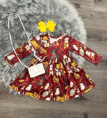 Broom Sticks & Owls Dress for babies - adorable and whimsical design perfect for little ones.