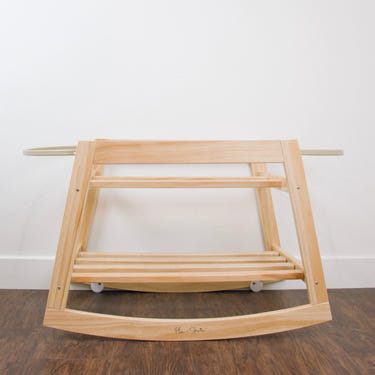 Classic Rocking Moses Bassinet Stand with brake in natural finish, perfect for soothing your baby safely.