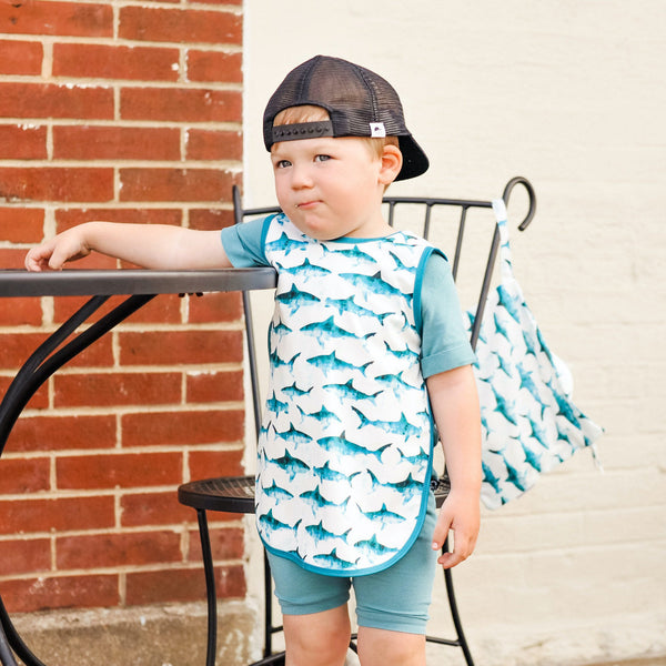 Shark Attack Bapron for babies, featuring a playful shark design, angled view showcasing its unique style and functionality.