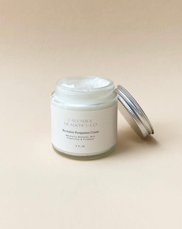 Revitalize Postpartum Cream 4oz - Nourishing body care for new moms, promoting skin recovery and hydration.