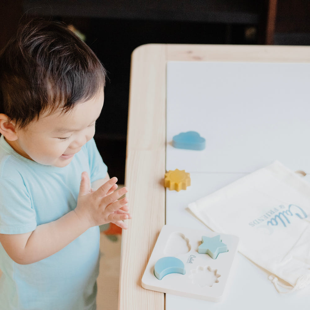 "Thomas Puzzle diaper bag featuring playful design, spacious compartments, and durable materials for stylish parenting."