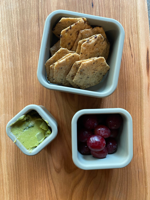 Silicone Bento box set of 3 for baby food storage and on-the-go meals, shown at angle 11.