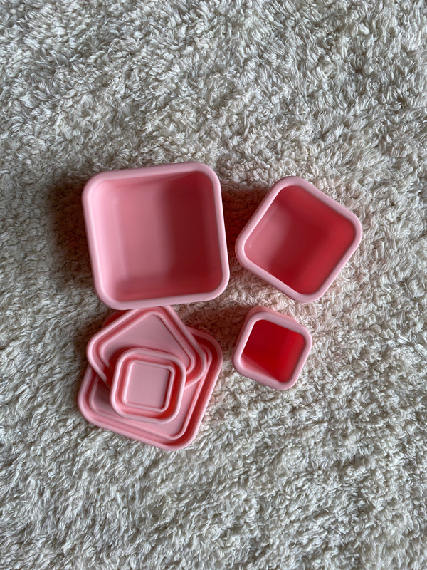 Silicone Bento box set of 3 for baby food storage and on-the-go meals, angled view showcasing vibrant colors.