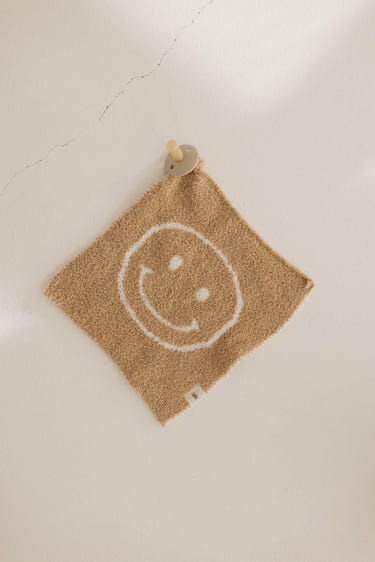 Tan Just Smile Lovey for babies, soft and cuddly comfort for your little one. Perfect for snuggles and playtime.