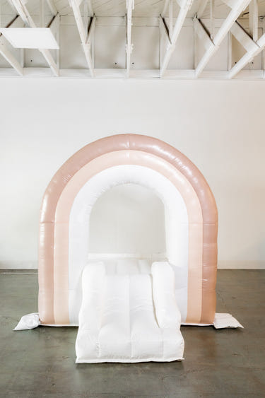 Mini Boho Beige Rainbow Bounce House for outdoor playsets, perfect for toddlers and kids' fun activities.