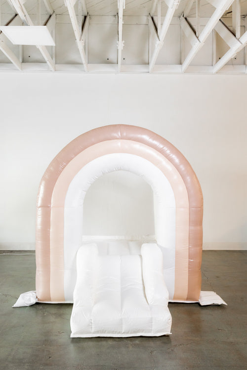 Mini Boho Beige Rainbow Bounce House for outdoor playsets, perfect for toddlers and kids' fun activities.