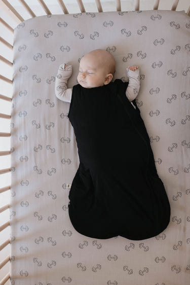 Bamboo Sleep Sack in Midnight Black - Soft, breathable swaddle for comfortable baby sleep.
