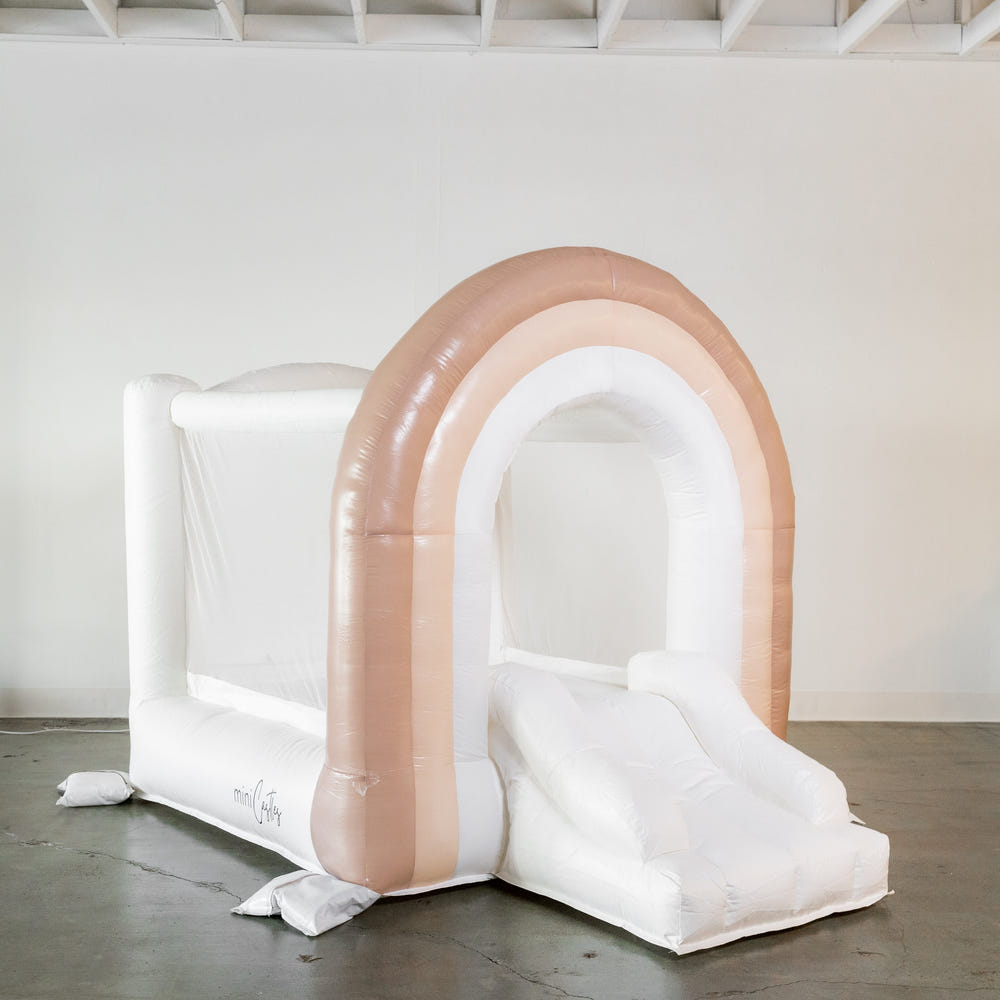 Mini Boho Beige Rainbow Bounce House for outdoor playsets, perfect for toddlers and kids' fun activities.