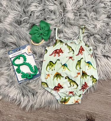 Bamboo Dino Romper for babies, featuring a cute dinosaur design in a soft, eco-friendly fabric. Perfect for playtime!