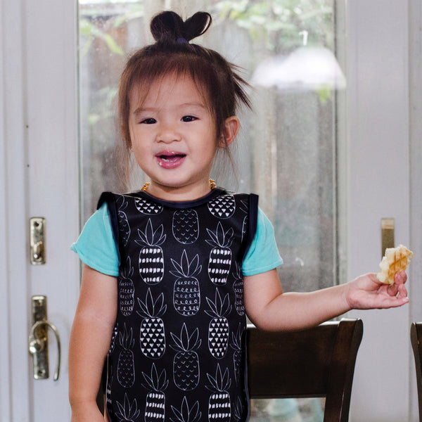Pineapple monochrome bapron for babies, stylish and practical, shown at angle 12.
