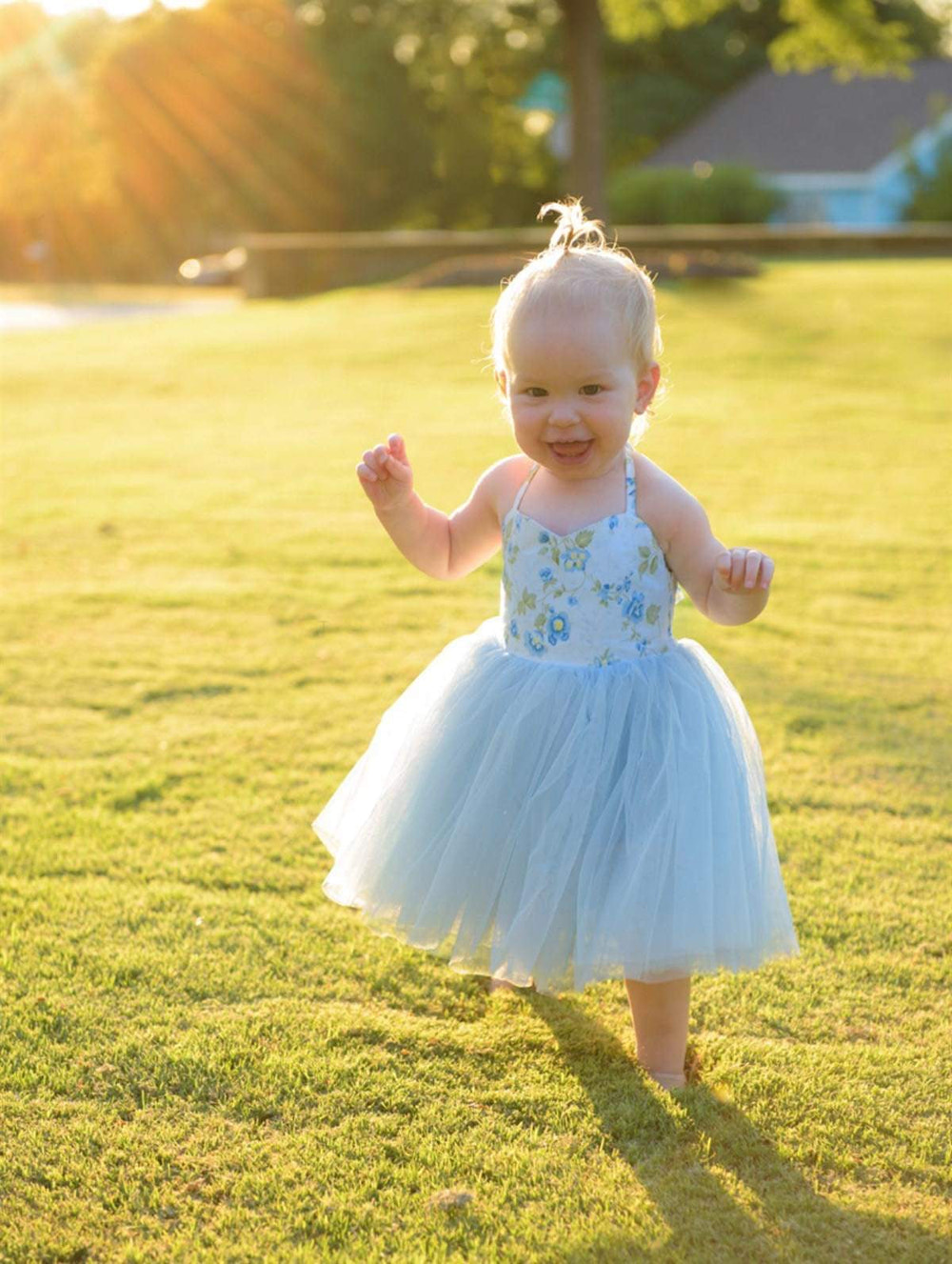 Blue Blossoms Tulle Dress for babies, featuring a delicate floral design and soft tulle fabric, perfect for special occasions.