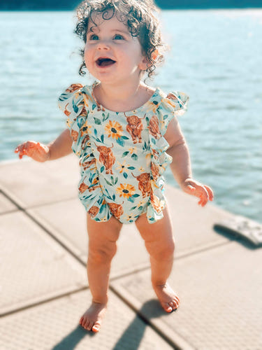 Blue highland ruffle swimsuit for babies, perfect for summer fun and stylish beach outings.