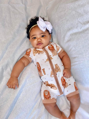 Just Lion Around shorties for babies - cozy sleepsuit and pyjamas featuring a playful lion design.