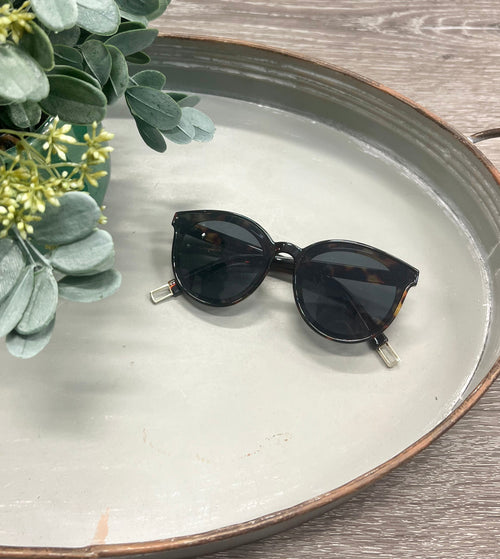 Colorful children's sunglasses at an angle, perfect for summer accessories and outdoor fun.