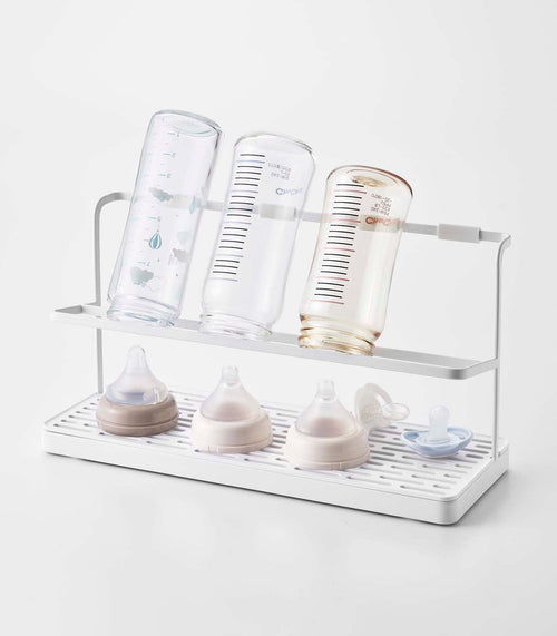 Countertop steel bottle drying rack for efficient and stylish baby bottle drying.