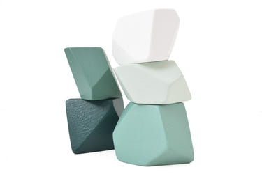 "Juniper Set of 8 early learning and sensory play toys for babies, promoting development and engagement."