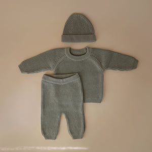 Chunky knit pants for babies, cozy and stylish, shown from angle 9. Perfect for comfort and warmth.