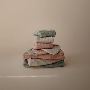 Chunky knit pants for babies, cozy and stylish, shown from angle 10. Perfect for comfort and warmth.