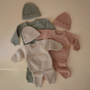 Chunky knit pants for babies in a cozy design, showcased at angle 11 for a stylish look.