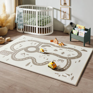 Tiny Land® Double-Sided Baby Playmat Urban Zoo Adventure at an angle, showcasing vibrant designs for playtime fun.