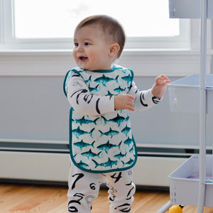 Shark Attack Bapron for babies, featuring a fun shark design, angled view showcasing its unique style and functionality.