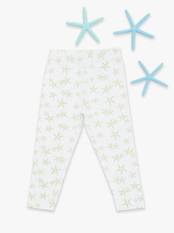 Organic cotton leggings in green starfish pattern, angle view, perfect for babies and toddlers.