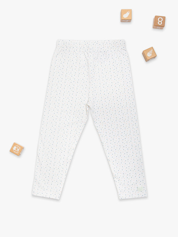 Organic cotton polka dot leggings for babies, angle view showcasing soft fabric and playful design.
